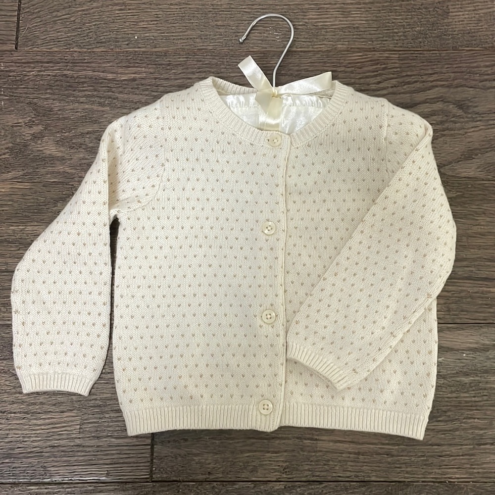 Nordstrom baby cream and gold cardigan